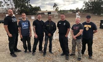 Lrg-man-k9-police-officers-in-casual-attire-with-the-director-of-training